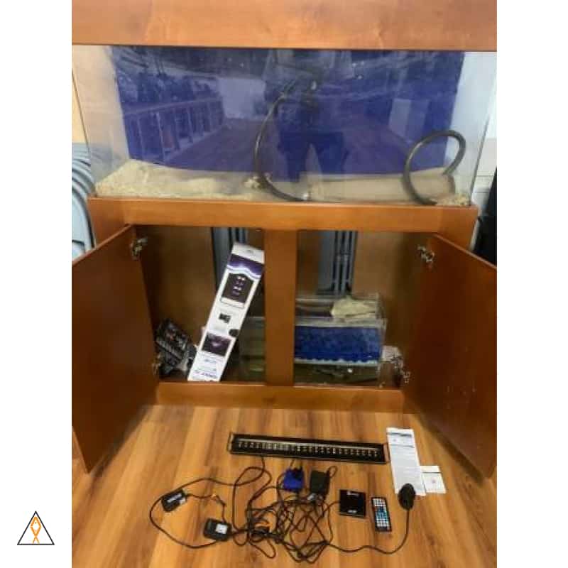 Traditional acrylic aquarium with wood stand and hood - $800